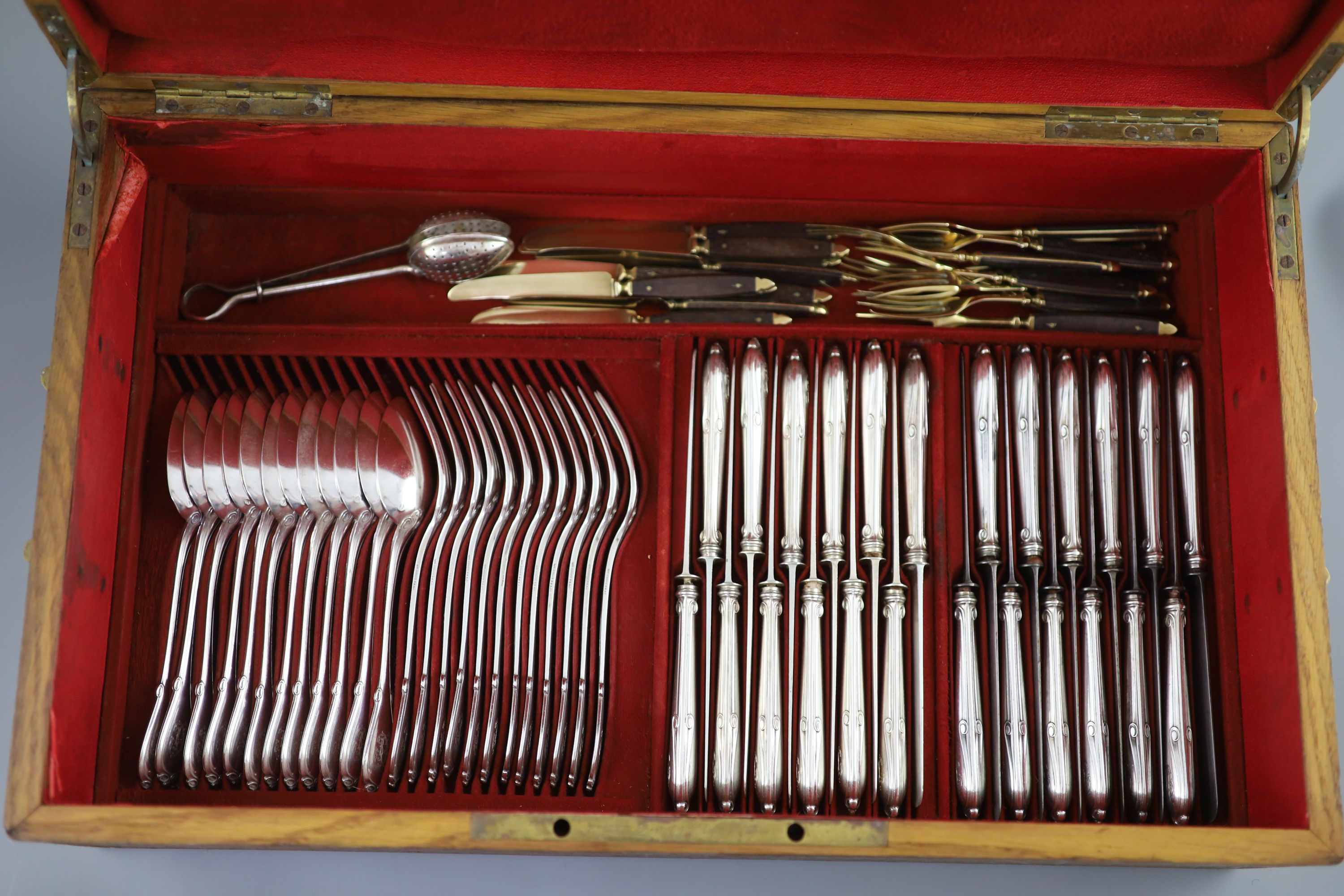 A late 19th century French canteen of silver 950 standard cutlery, in a brass mounted oak canteen, by Prevost Recipon & Cie (Maison Odiot)